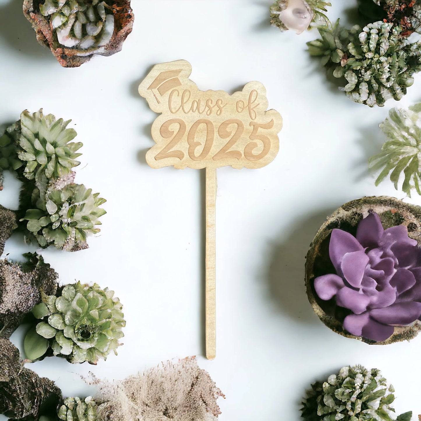Graduation center piece stake